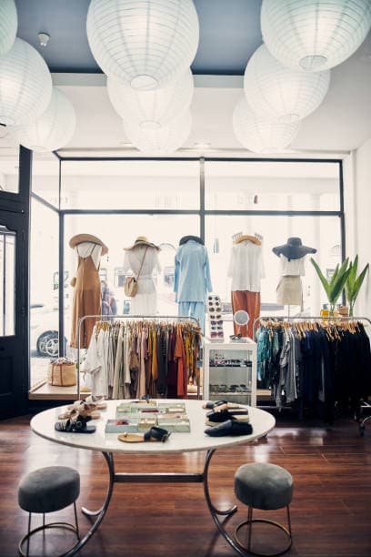 Independent boutique sales floor with apparel displays
